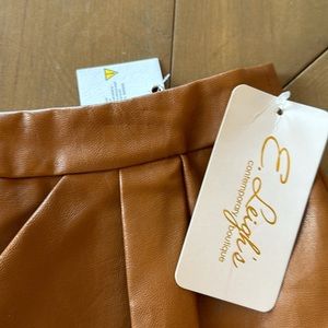 Lush brand camel pleather skirt with tulip detail in front. Size S